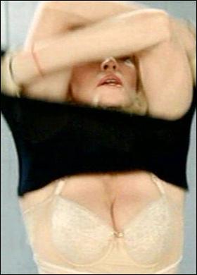 Madonna strips in the 4 Minutes video