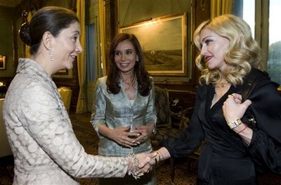 Madonna meets Ingrid Betancourt while Argentine president Fernandez looks on