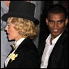 Lap dancer or lap dog? Madonna's boyfriend Brahim Zaibat was running around after the music superstar