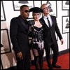 Madonna on the red carpet of the Grammy Awards, with collaborators Nas and Diplo