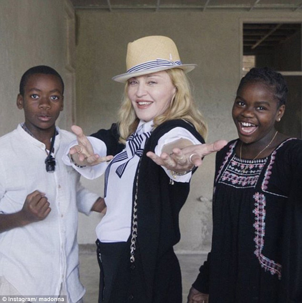 Madonna with David and Mercy James in Malawi last year