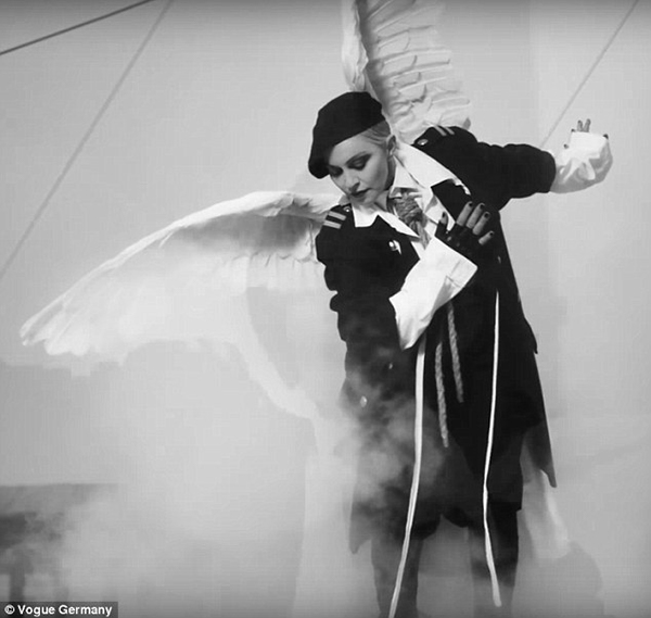 'We should all be feminists': Madonna rocked a pair of angel wings with a noose necktie in Her-Story, a 13-minute b&w short film in honor of International Women's Day