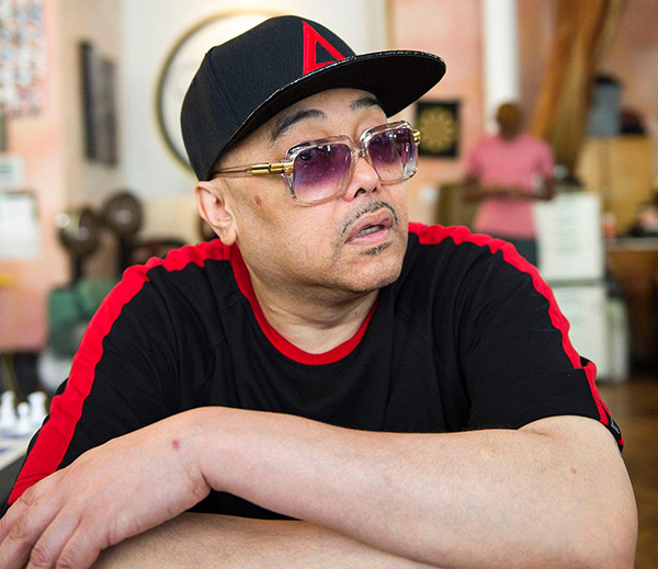 'What am I gonna keep them for? I don't wear them,' said Shue, photographed at Harlem Masters barbershop on Lenox Ave. on Thursday.