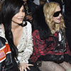 Side by side: Kylie and Madonna were seated together front row at the show