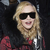 Star: Madonna looked happy and relaxed. Her blonde hair was softly styled and she wore flawless make-up including lip color that matched the shade of her coat