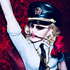 Madonna celebrating her 61st birthday, dressed up as a general. Photo by Ricardo Gomes.