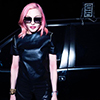 Madonna with pink hair, posing posing in a Mercedes Benz.