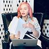 Madonna with pink hair, writing the screenplay for her upcoming biopic.