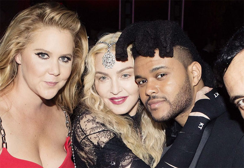 Madonna poses with The Weeknd (r) and Amy Schumer (l) at the 2016 Met Gala